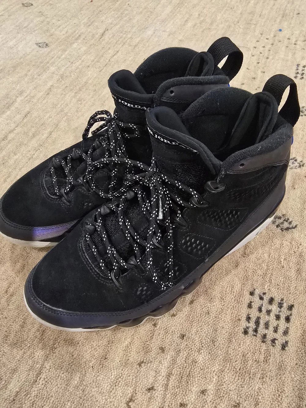 Air Jordan Black Suede High-Top Sneakers with Blue Accent